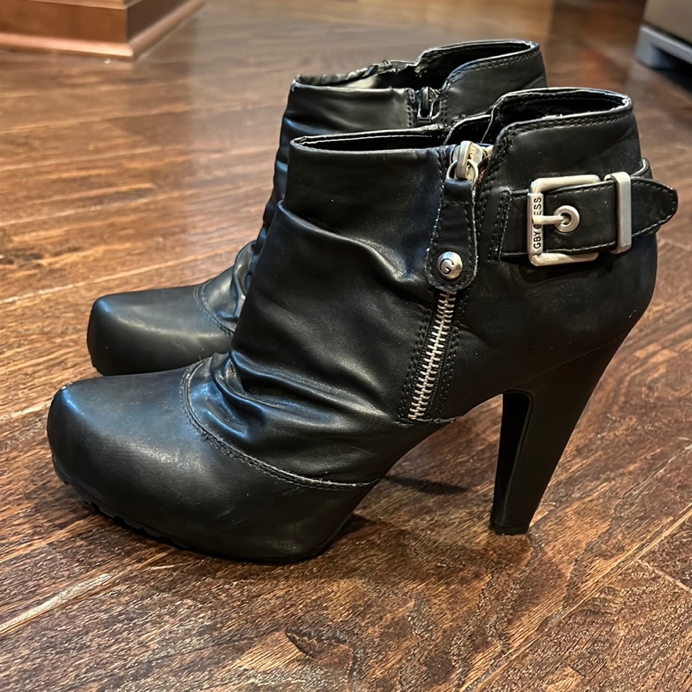Guess booties. Worn only a few times. Few tiny scratches, not very visible.